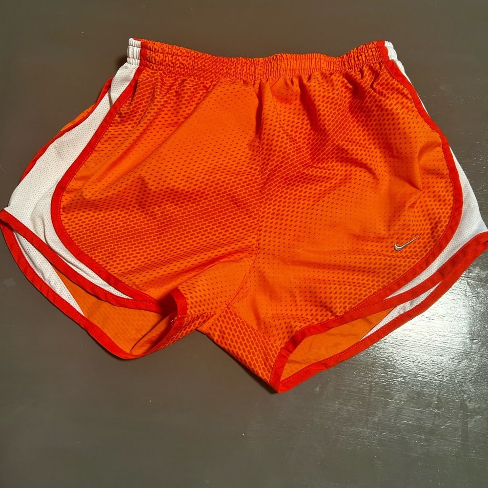 Neon orange running shorts